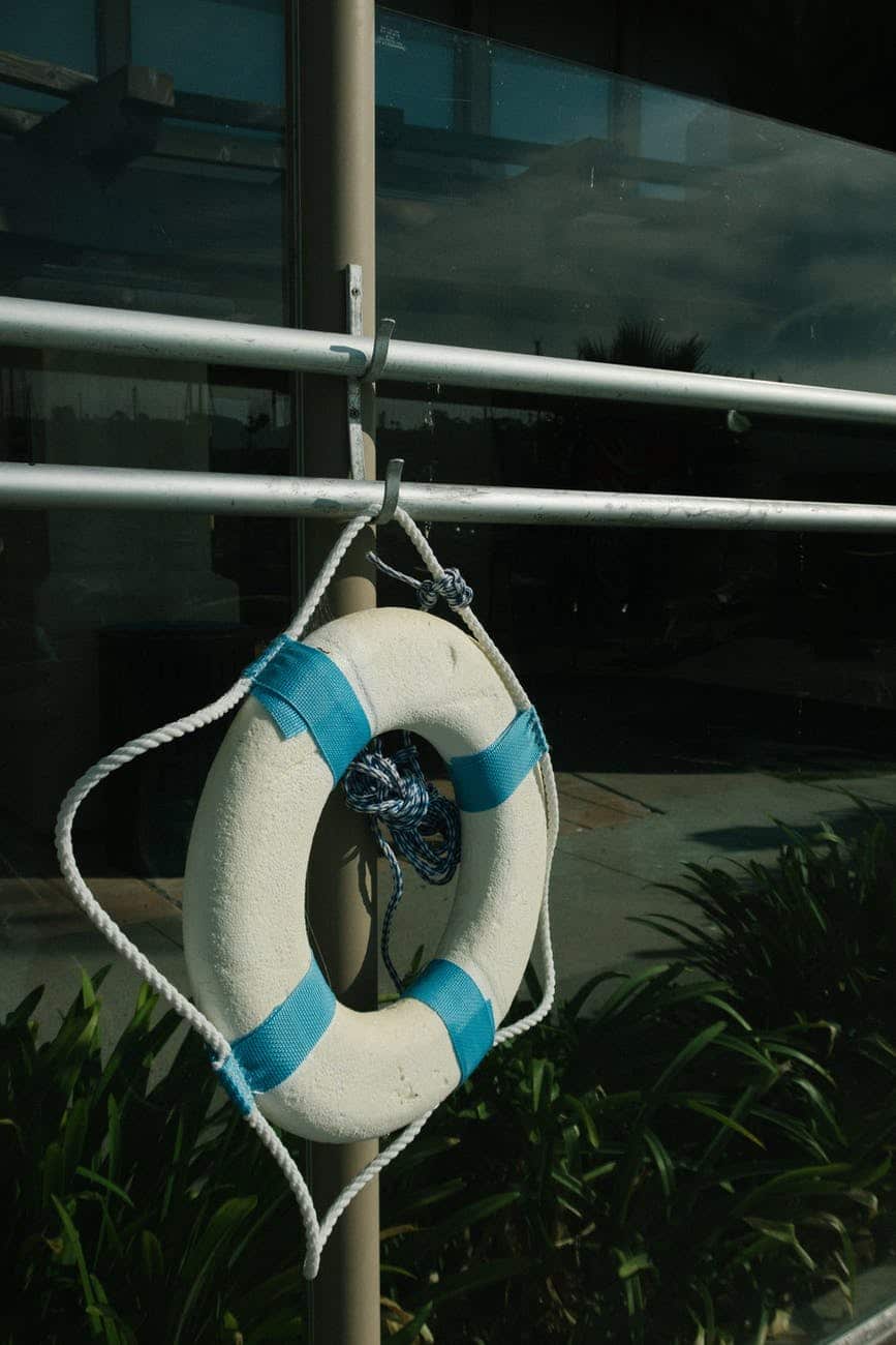 white and teal safety ring