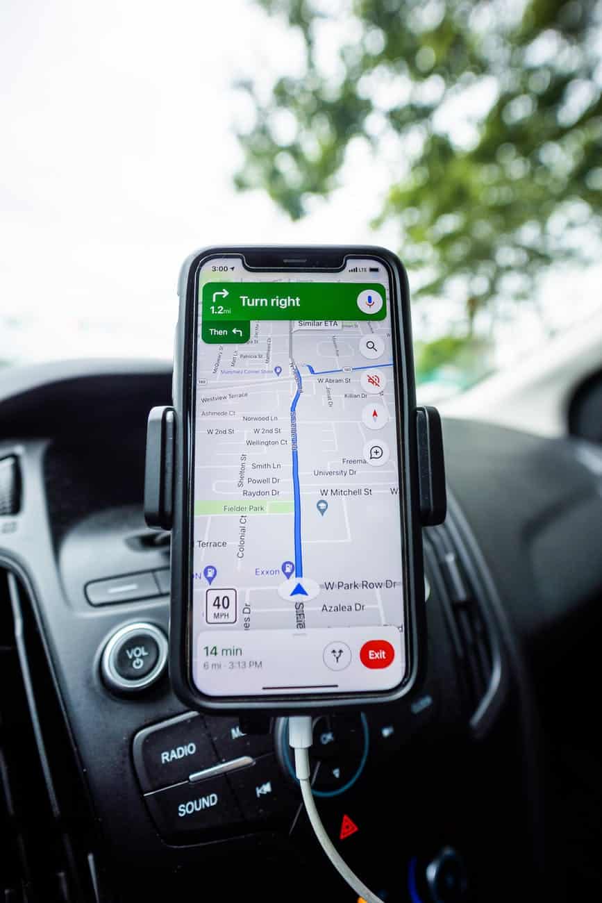 cellphone on a stand with navigation map application open