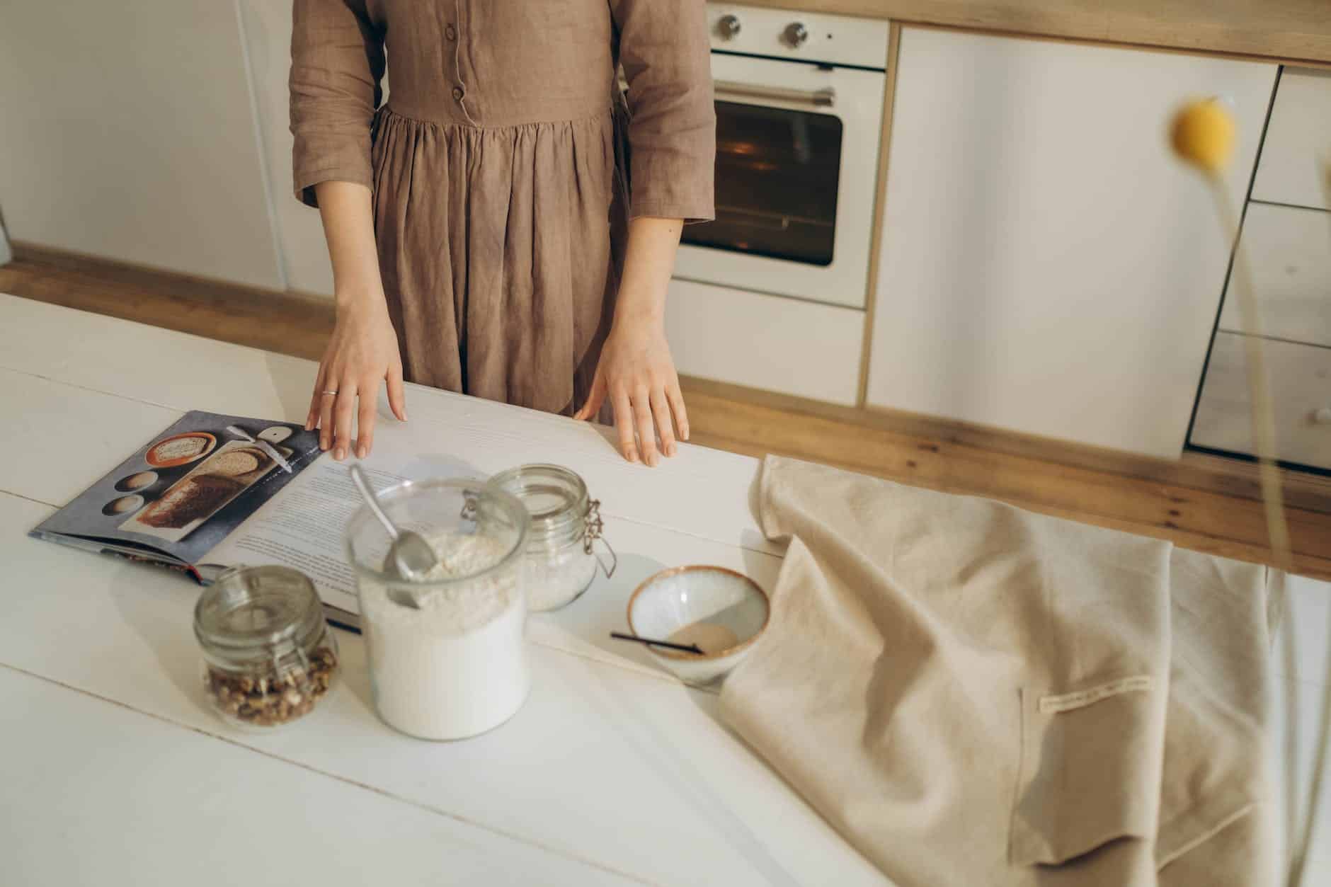 a person holding a cookbook